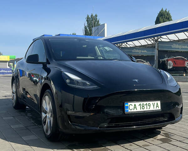 Черный Тесла Model Y, объемом двигателя 0 л и пробегом 54 тыс. км за 26900 $, фото 2 на Automoto.ua