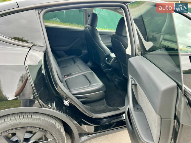 Черный Тесла Model Y, объемом двигателя 0 л и пробегом 25 тыс. км за 29500 $, фото 15 на Automoto.ua