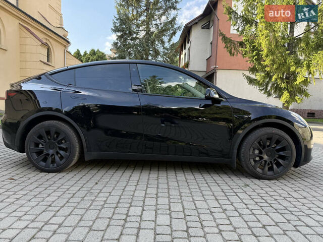 Черный Тесла Model Y, объемом двигателя 0 л и пробегом 58 тыс. км за 27500 $, фото 6 на Automoto.ua