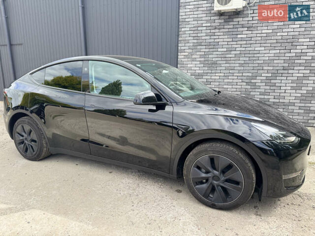 Черный Тесла Model Y, объемом двигателя 0 л и пробегом 2 тыс. км за 38300 $, фото 23 на Automoto.ua