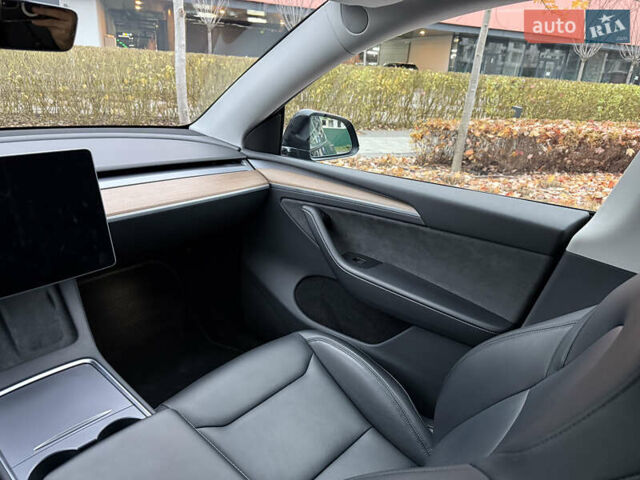 Черный Тесла Model Y, объемом двигателя 0 л и пробегом 48 тыс. км за 31500 $, фото 25 на Automoto.ua