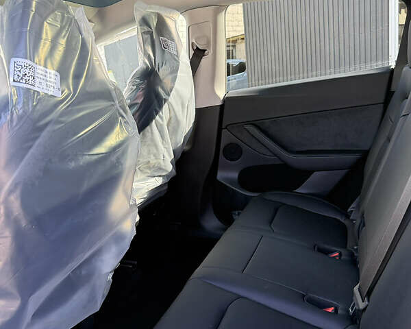Черный Тесла Model Y, объемом двигателя 0 л и пробегом 1 тыс. км за 37500 $, фото 22 на Automoto.ua