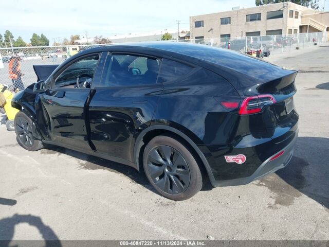 Черный Тесла Model Y, объемом двигателя 0 л и пробегом 13 тыс. км за 19500 $, фото 3 на Automoto.ua