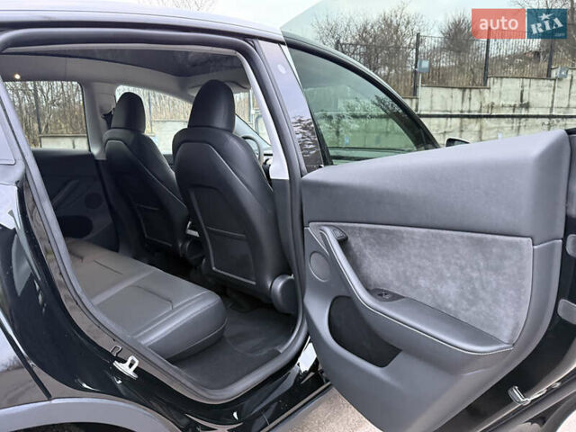 Черный Тесла Model Y, объемом двигателя 0 л и пробегом 19 тыс. км за 36500 $, фото 49 на Automoto.ua