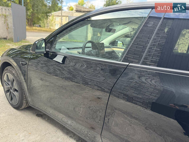 Черный Тесла Model Y, объемом двигателя 0 л и пробегом 2 тыс. км за 38300 $, фото 14 на Automoto.ua