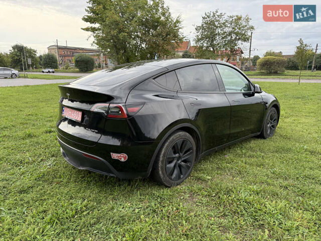 Черный Тесла Model Y, объемом двигателя 0 л и пробегом 18 тыс. км за 27998 $, фото 1 на Automoto.ua