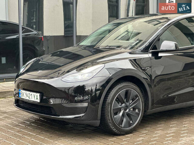 Черный Тесла Model Y, объемом двигателя 0 л и пробегом 4 тыс. км за 37777 $, фото 1 на Automoto.ua