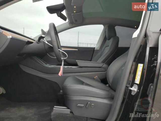 Черный Тесла Model Y, объемом двигателя 0 л и пробегом 7 тыс. км за 32500 $, фото 11 на Automoto.ua