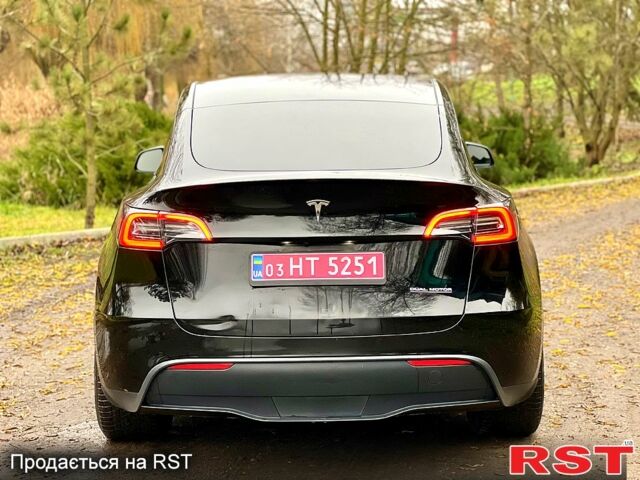 Черный Тесла Model Y, объемом двигателя 0.39 л и пробегом 71 тыс. км за 24400 $, фото 6 на Automoto.ua