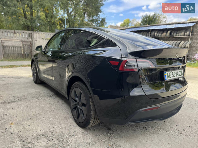 Черный Тесла Model Y, объемом двигателя 0 л и пробегом 2 тыс. км за 38300 $, фото 10 на Automoto.ua