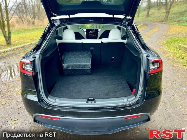 Черный Тесла Model Y, объемом двигателя 0.39 л и пробегом 71 тыс. км за 24400 $, фото 11 на Automoto.ua