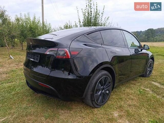 Черный Тесла Model Y, объемом двигателя 0 л и пробегом 16 тыс. км за 31000 $, фото 1 на Automoto.ua