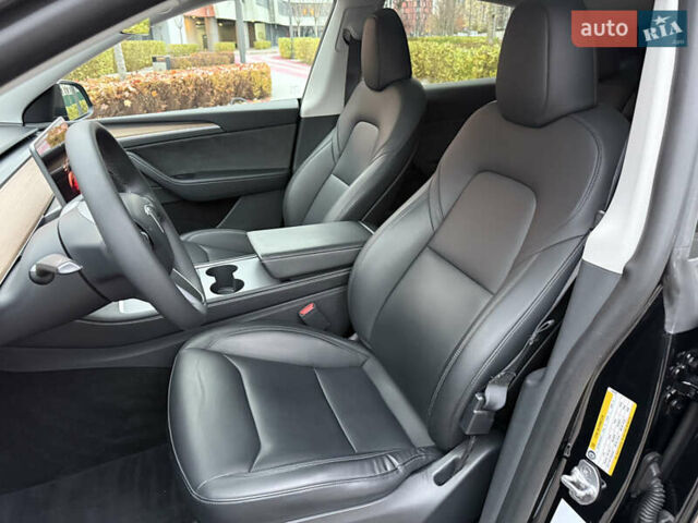 Черный Тесла Model Y, объемом двигателя 0 л и пробегом 48 тыс. км за 31500 $, фото 28 на Automoto.ua