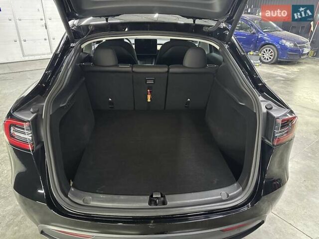 Черный Тесла Model Y, объемом двигателя 0 л и пробегом 80 тыс. км за 28000 $, фото 10 на Automoto.ua