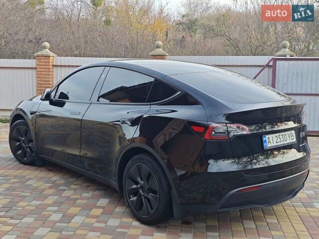 Черный Тесла Model Y, объемом двигателя 0 л и пробегом 13 тыс. км за 32000 $, фото 24 на Automoto.ua