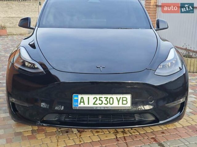 Черный Тесла Model Y, объемом двигателя 0 л и пробегом 13 тыс. км за 32000 $, фото 1 на Automoto.ua