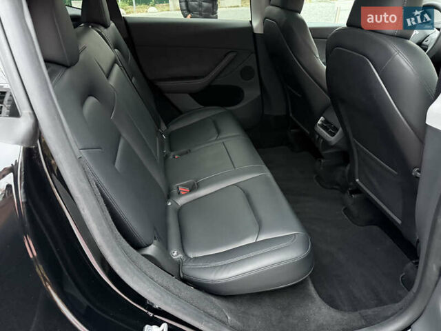 Черный Тесла Model Y, объемом двигателя 0 л и пробегом 48 тыс. км за 31500 $, фото 31 на Automoto.ua