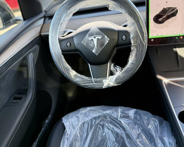 Черный Тесла Model Y, объемом двигателя 0 л и пробегом 1 тыс. км за 37500 $, фото 29 на Automoto.ua
