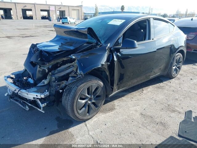 Черный Тесла Model Y, объемом двигателя 0 л и пробегом 13 тыс. км за 19500 $, фото 2 на Automoto.ua