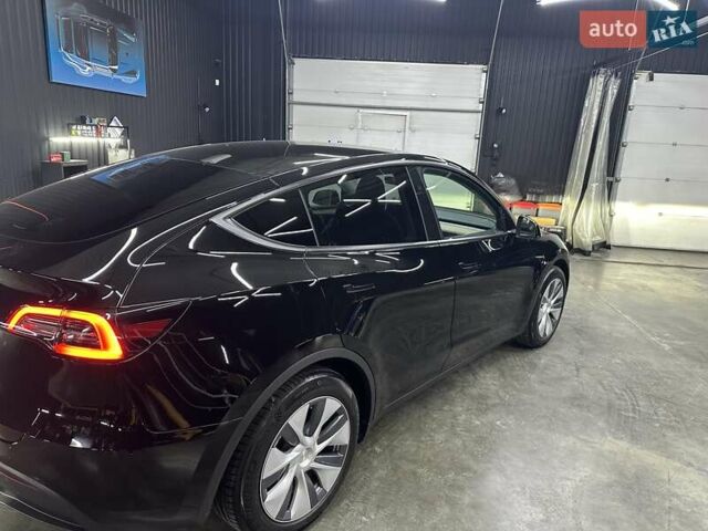 Черный Тесла Model Y, объемом двигателя 0 л и пробегом 80 тыс. км за 28000 $, фото 2 на Automoto.ua