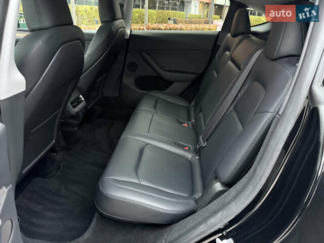 Черный Тесла Model Y, объемом двигателя 0 л и пробегом 48 тыс. км за 31500 $, фото 26 на Automoto.ua