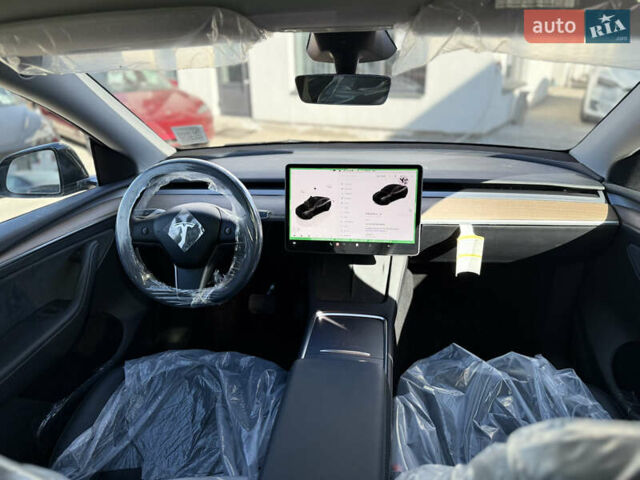 Черный Тесла Model Y, объемом двигателя 0 л и пробегом 1 тыс. км за 37500 $, фото 27 на Automoto.ua