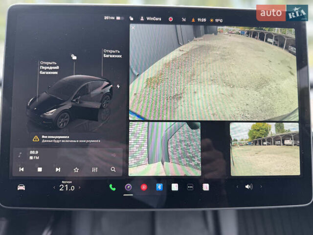 Черный Тесла Model Y, объемом двигателя 0 л и пробегом 2 тыс. км за 38300 $, фото 41 на Automoto.ua