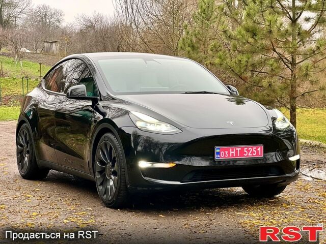 Черный Тесла Model Y, объемом двигателя 0.39 л и пробегом 71 тыс. км за 24400 $, фото 1 на Automoto.ua