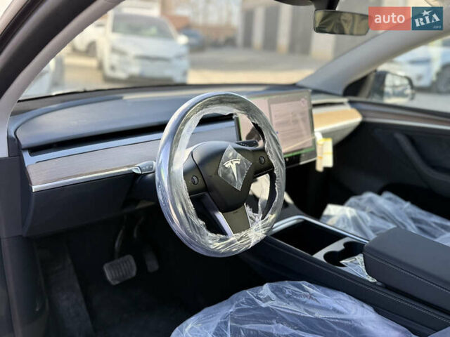 Черный Тесла Model Y, объемом двигателя 0 л и пробегом 1 тыс. км за 37500 $, фото 21 на Automoto.ua