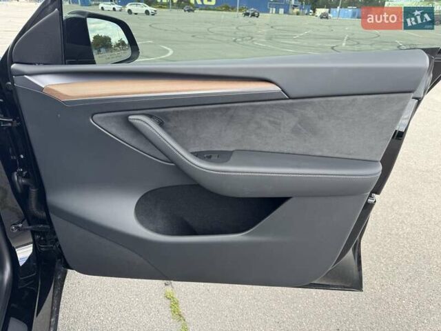 Черный Тесла Model Y, объемом двигателя 0 л и пробегом 10 тыс. км за 34700 $, фото 28 на Automoto.ua