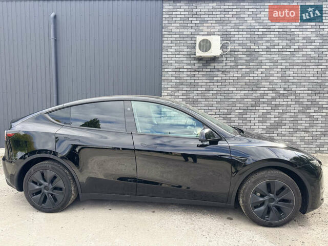 Черный Тесла Model Y, объемом двигателя 0 л и пробегом 2 тыс. км за 38300 $, фото 24 на Automoto.ua