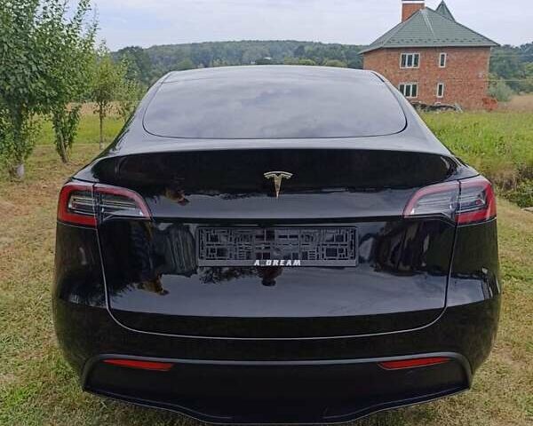 Черный Тесла Model Y, объемом двигателя 0 л и пробегом 16 тыс. км за 31000 $, фото 2 на Automoto.ua