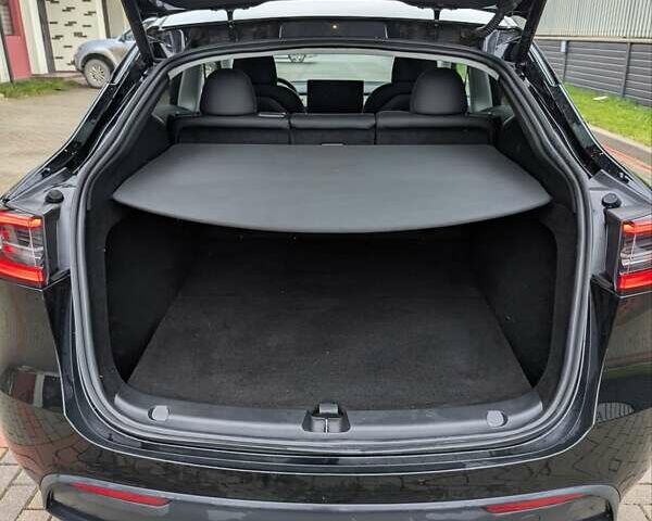 Чорний Тесла Model Y, об'ємом двигуна 0 л та пробігом 17 тис. км за 27500 $, фото 23 на Automoto.ua