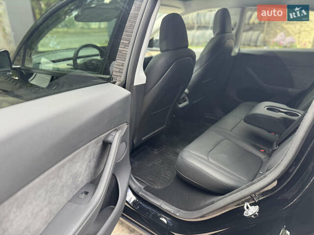 Черный Тесла Model Y, объемом двигателя 0 л и пробегом 2 тыс. км за 38300 $, фото 29 на Automoto.ua