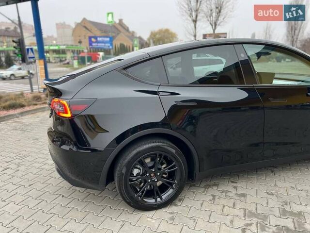 Черный Тесла Model Y, объемом двигателя 0 л и пробегом 19 тыс. км за 33000 $, фото 1 на Automoto.ua