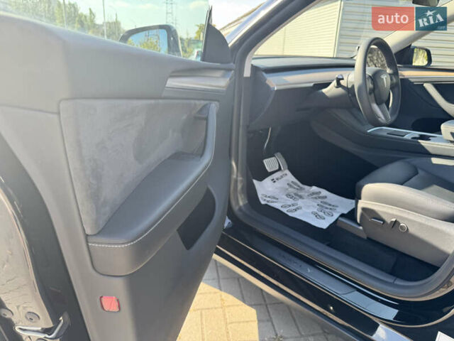 Черный Тесла Model Y, объемом двигателя 0 л и пробегом 32 тыс. км за 38000 $, фото 20 на Automoto.ua