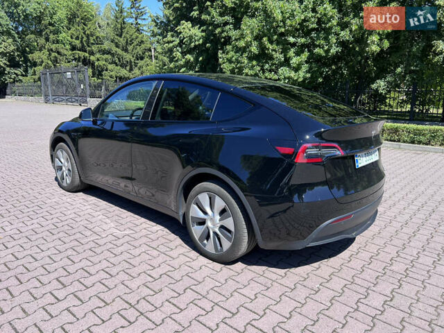 Чорний Тесла Model Y, об'ємом двигуна 0 л та пробігом 46 тис. км за 26999 $, фото 10 на Automoto.ua