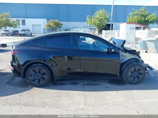 Черный Тесла Model Y, объемом двигателя 0 л и пробегом 13 тыс. км за 19500 $, фото 6 на Automoto.ua