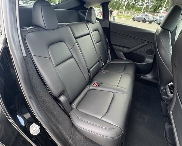 Черный Тесла Model Y, объемом двигателя 0 л и пробегом 10 тыс. км за 34700 $, фото 46 на Automoto.ua