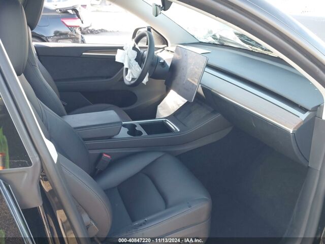 Черный Тесла Model Y, объемом двигателя 0 л и пробегом 13 тыс. км за 19500 $, фото 8 на Automoto.ua