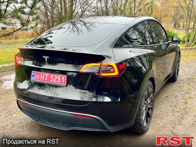 Черный Тесла Model Y, объемом двигателя 0.39 л и пробегом 71 тыс. км за 24400 $, фото 7 на Automoto.ua