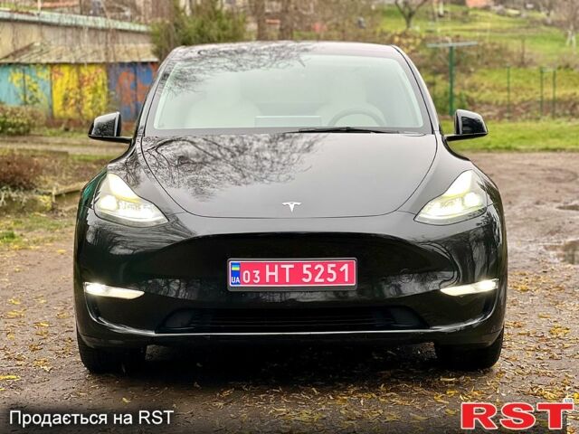 Черный Тесла Model Y, объемом двигателя 0.39 л и пробегом 71 тыс. км за 24400 $, фото 2 на Automoto.ua