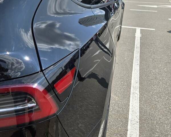 Чорний Тесла Model Y, об'ємом двигуна 0 л та пробігом 56 тис. км за 32000 $, фото 1 на Automoto.ua