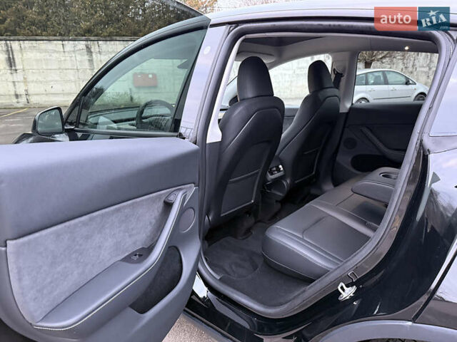 Черный Тесла Model Y, объемом двигателя 0 л и пробегом 19 тыс. км за 36500 $, фото 69 на Automoto.ua