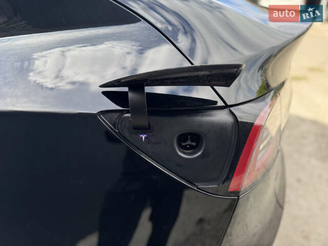 Черный Тесла Model Y, объемом двигателя 0 л и пробегом 2 тыс. км за 38300 $, фото 49 на Automoto.ua