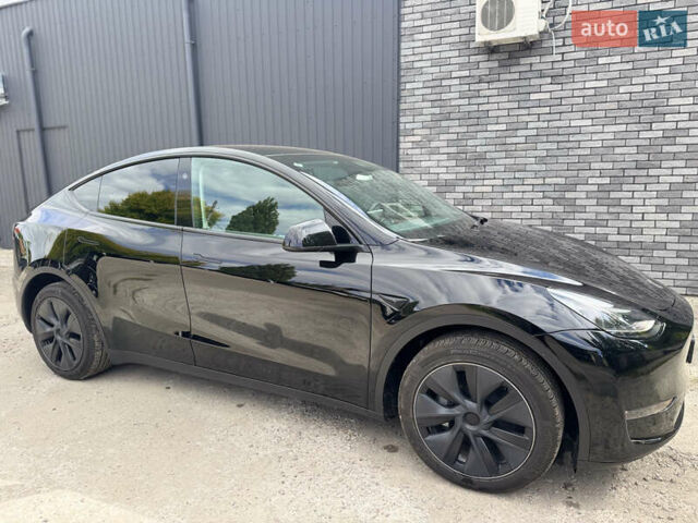 Черный Тесла Model Y, объемом двигателя 0 л и пробегом 2 тыс. км за 38300 $, фото 19 на Automoto.ua