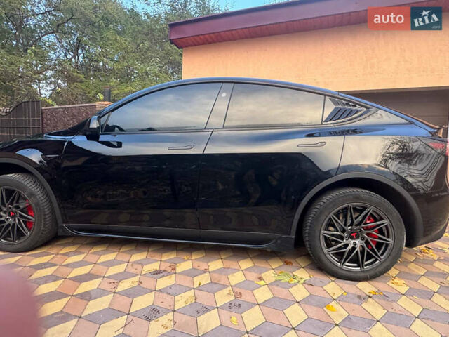 Черный Тесла Model Y, объемом двигателя 0 л и пробегом 13 тыс. км за 32000 $, фото 2 на Automoto.ua