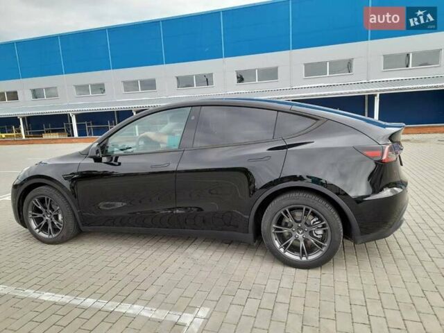 Черный Тесла Model Y, объемом двигателя 0 л и пробегом 21 тыс. км за 29000 $, фото 1 на Automoto.ua