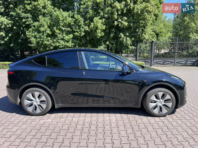 Чорний Тесла Model Y, об'ємом двигуна 0 л та пробігом 46 тис. км за 26999 $, фото 7 на Automoto.ua