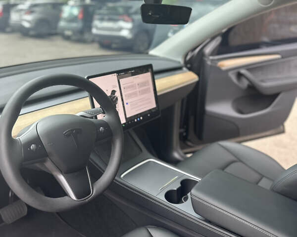 Черный Тесла Model Y, объемом двигателя 0 л и пробегом 7 тыс. км за 34300 $, фото 24 на Automoto.ua